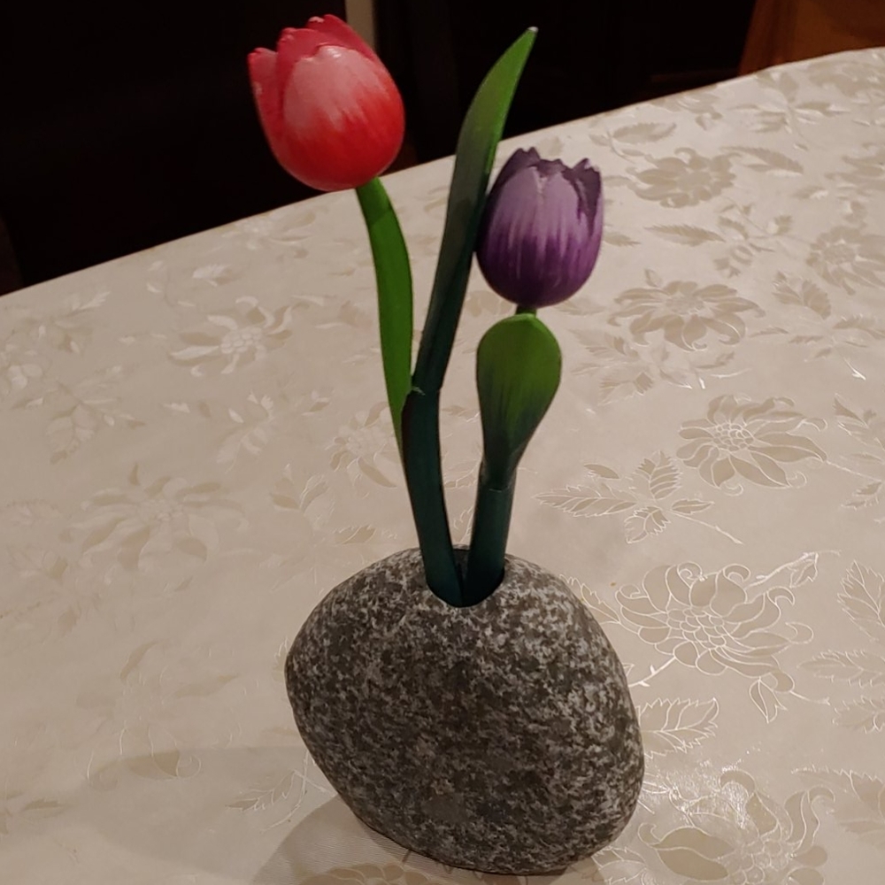 Stone vase with wooden flowers